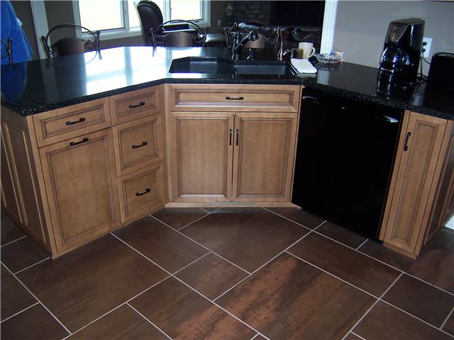 Maple wood with light brown stain and dark glaze